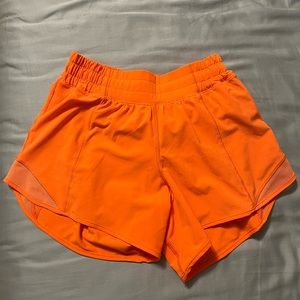 lululemon hotty hot highlight orange 4” inseam